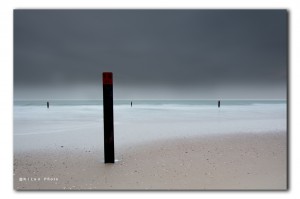 Strandpaal op het strand bij  Ouddorp